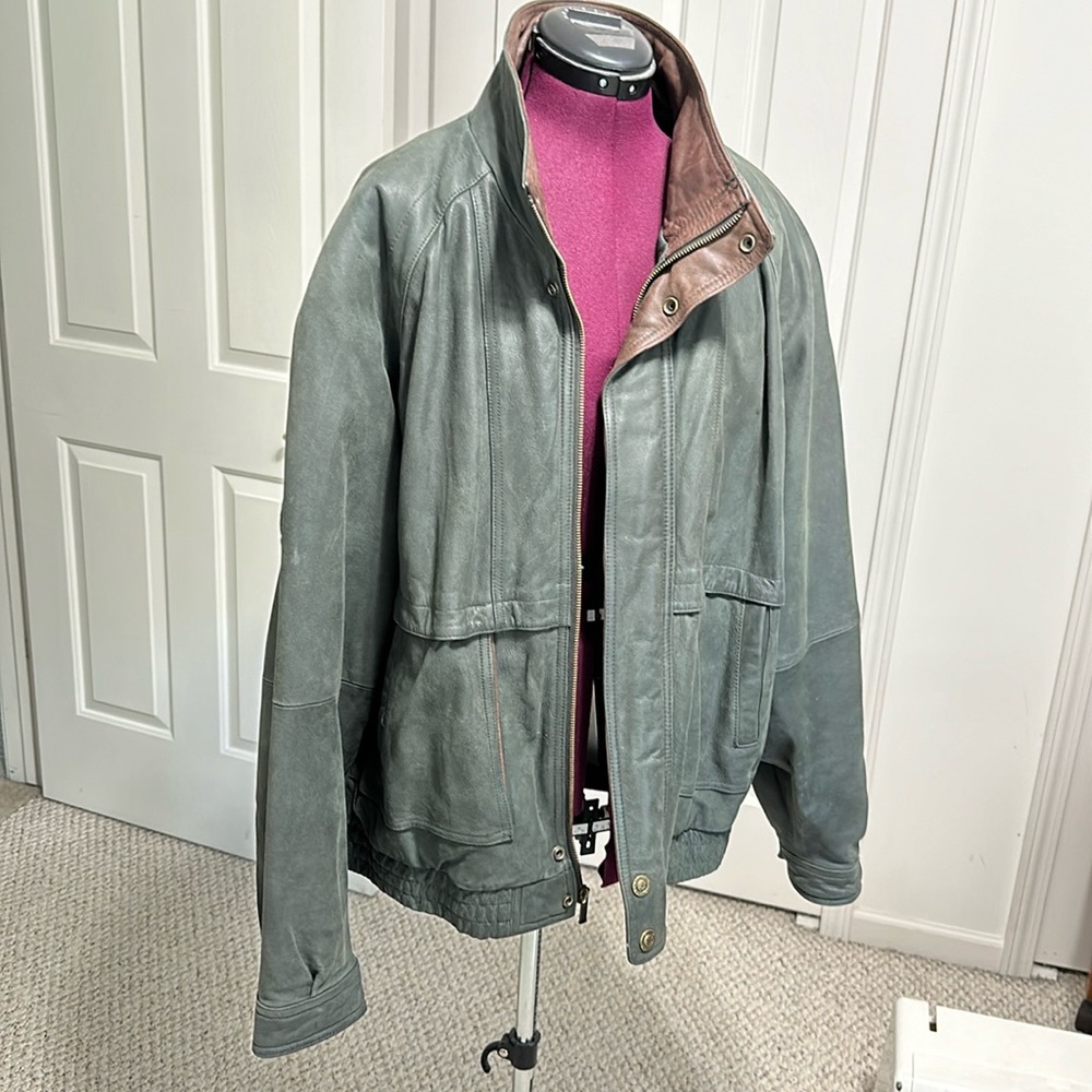 Leather jacket with removable lining.